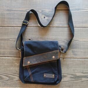 Augur Crossbody Messenger Bag Black Brown Canvas Leather Trim Flap Snap Travel